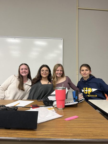 Student Council leadership team before a Student Council Meeting. 