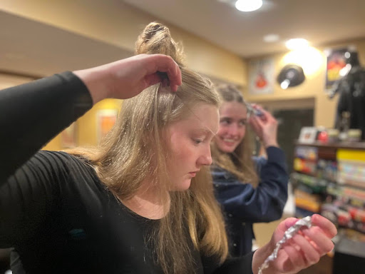 Madison Harward and Ellianna Smith dye their hair blue. 